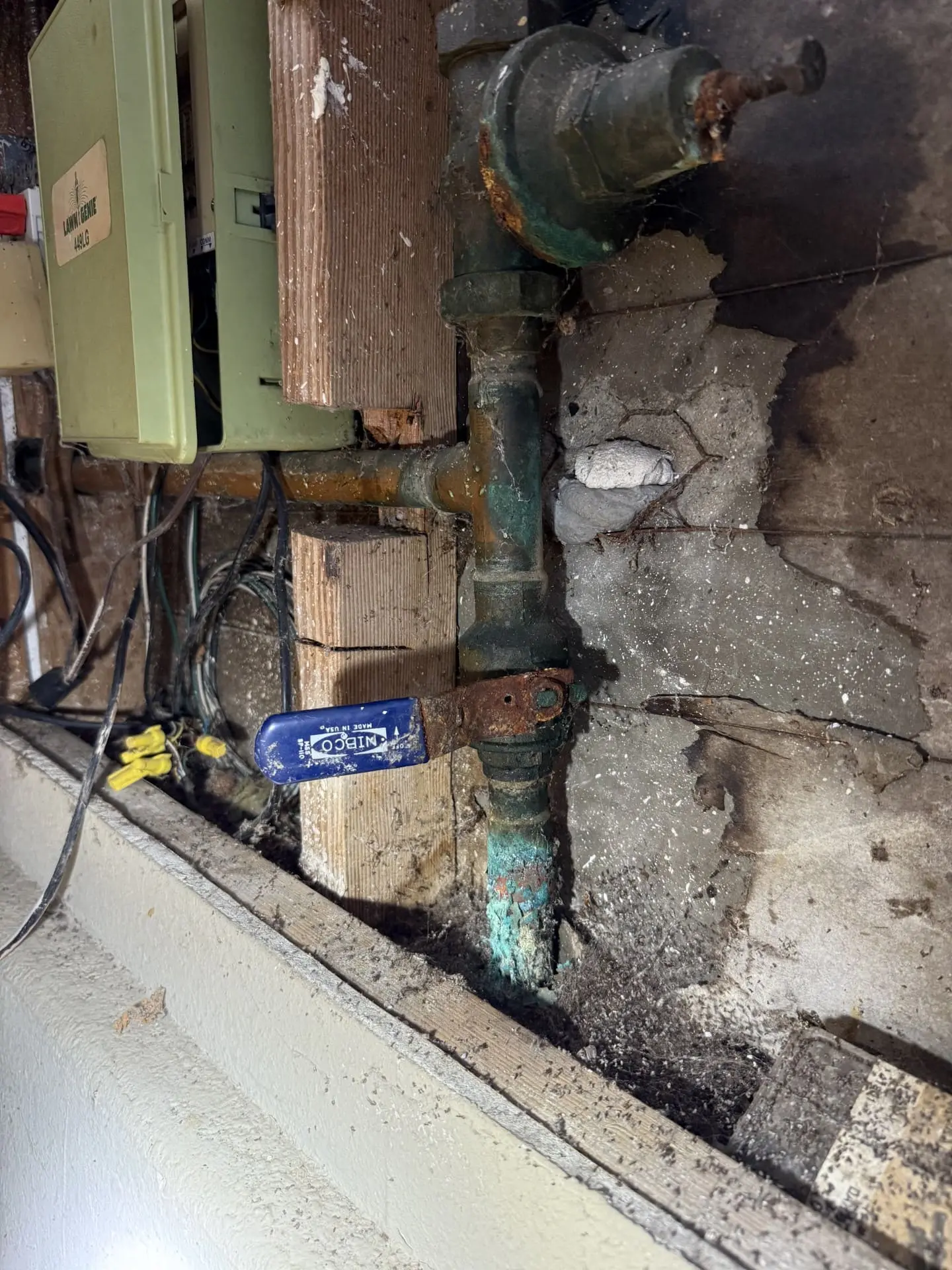Water Pipe Corrosion Damage Close-up of water corrosion damage found during a residential plumbing inspection in Anaheim, CA